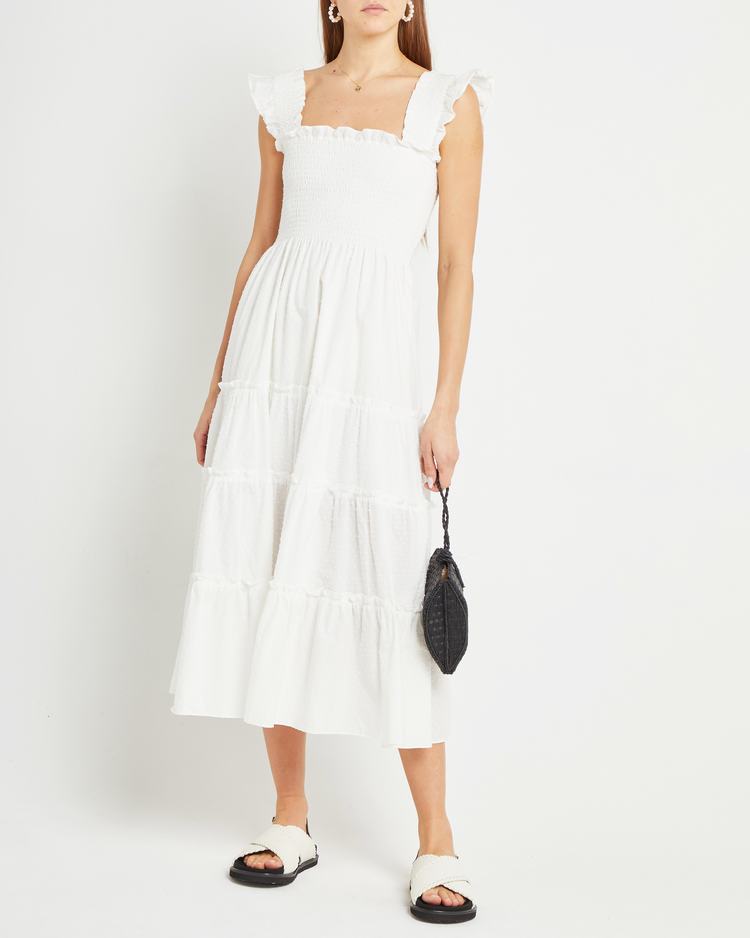 Fifth image of Calypso Maxi Dress, a white maxi dress, swiss dot material, smocked bodice, ruffles cap sleeves