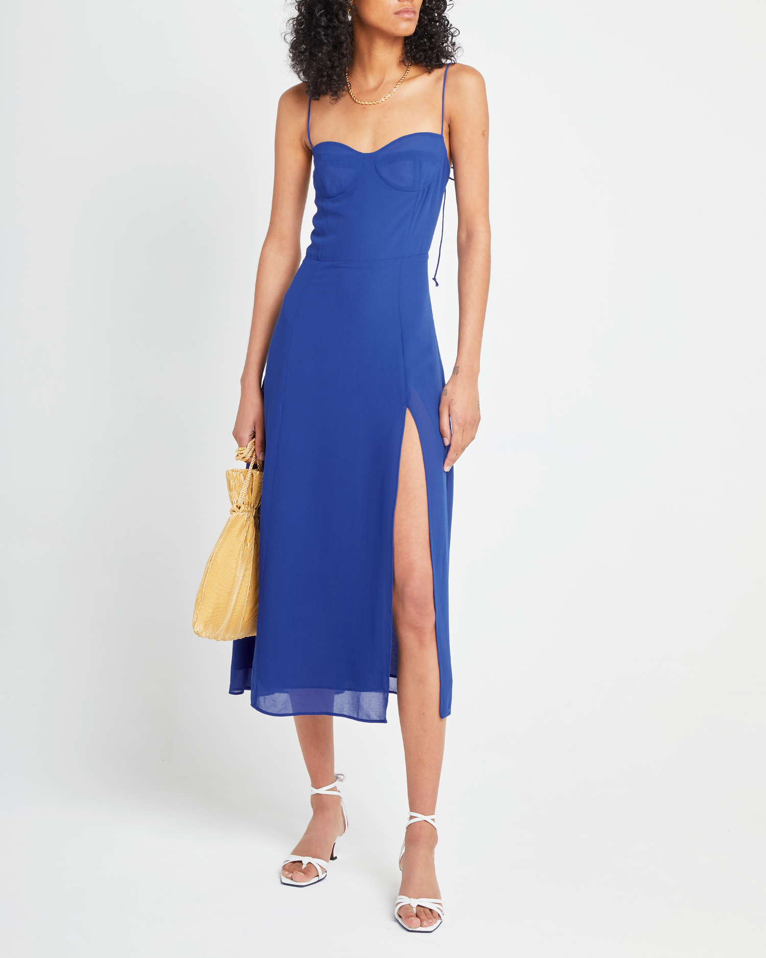 First image of Venus Dress, a blue midi dress, tie straps, spaghetti straps, side slit, bodice