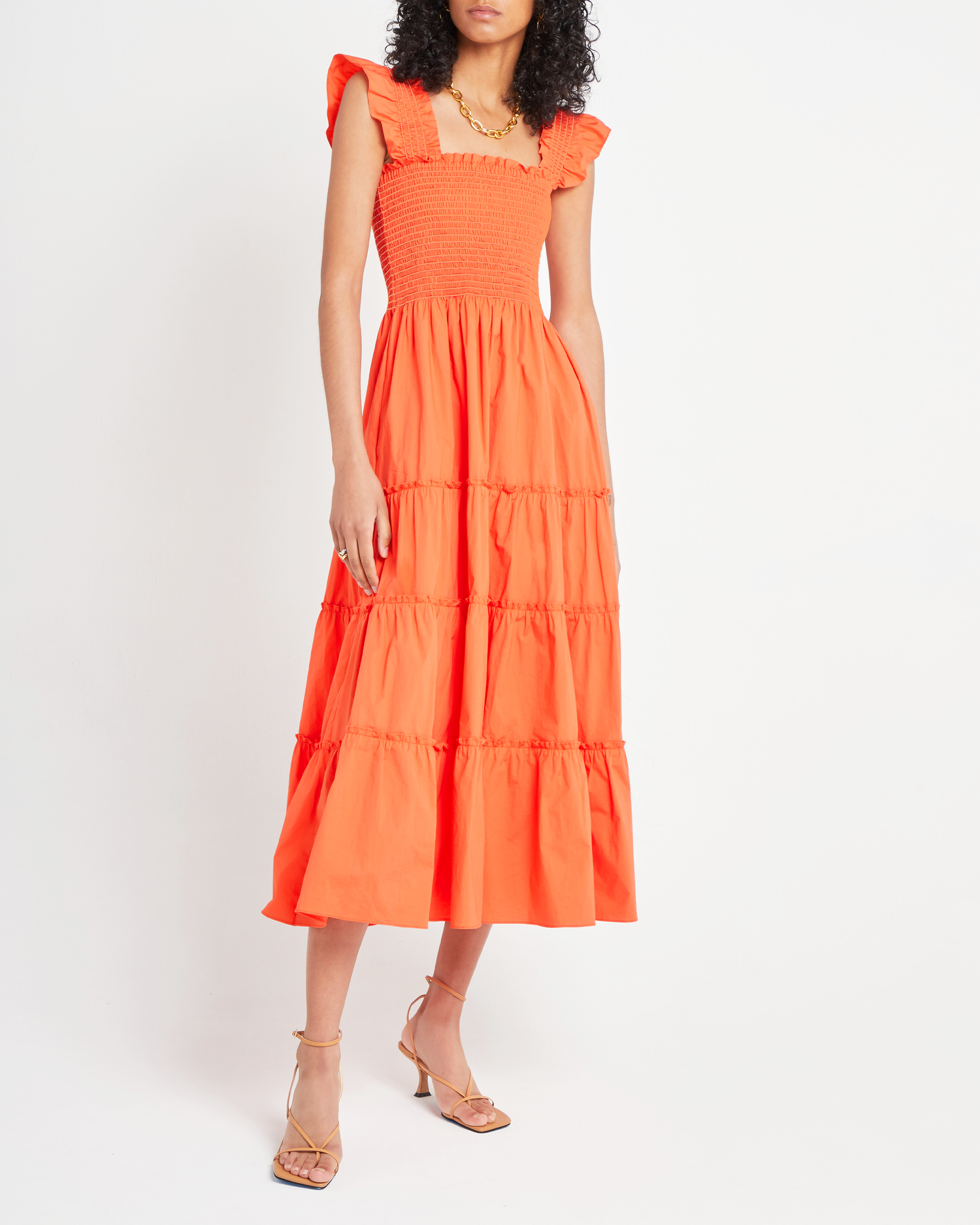 First image of Calypso Maxi Dress, a orange maxi dress,ruffle cap sleeves, smocked bodice