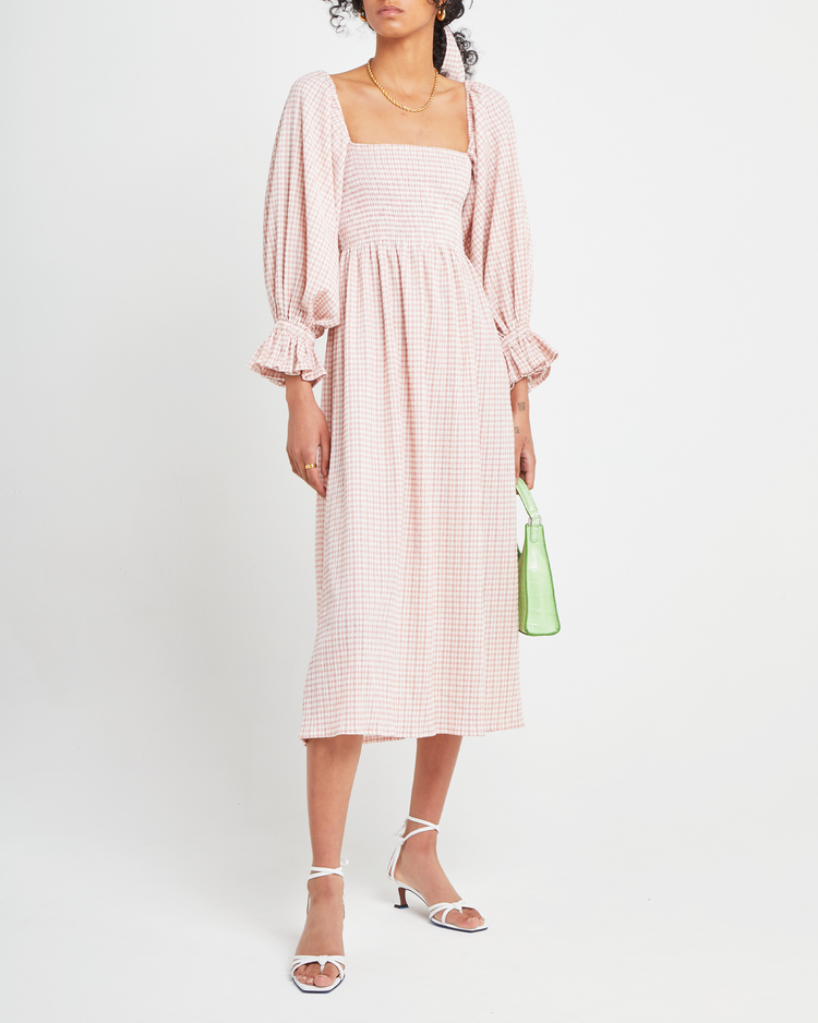 First image of Athena Dress, a pink midi dress, off shoulder, long sleeve, puff sleeves, smocked