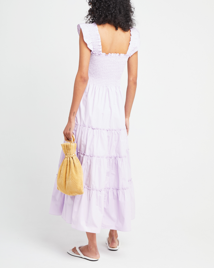 Second image of Calypso Maxi Dress, a purple maxi dress, ruffle cap sleeves, smocked bodice