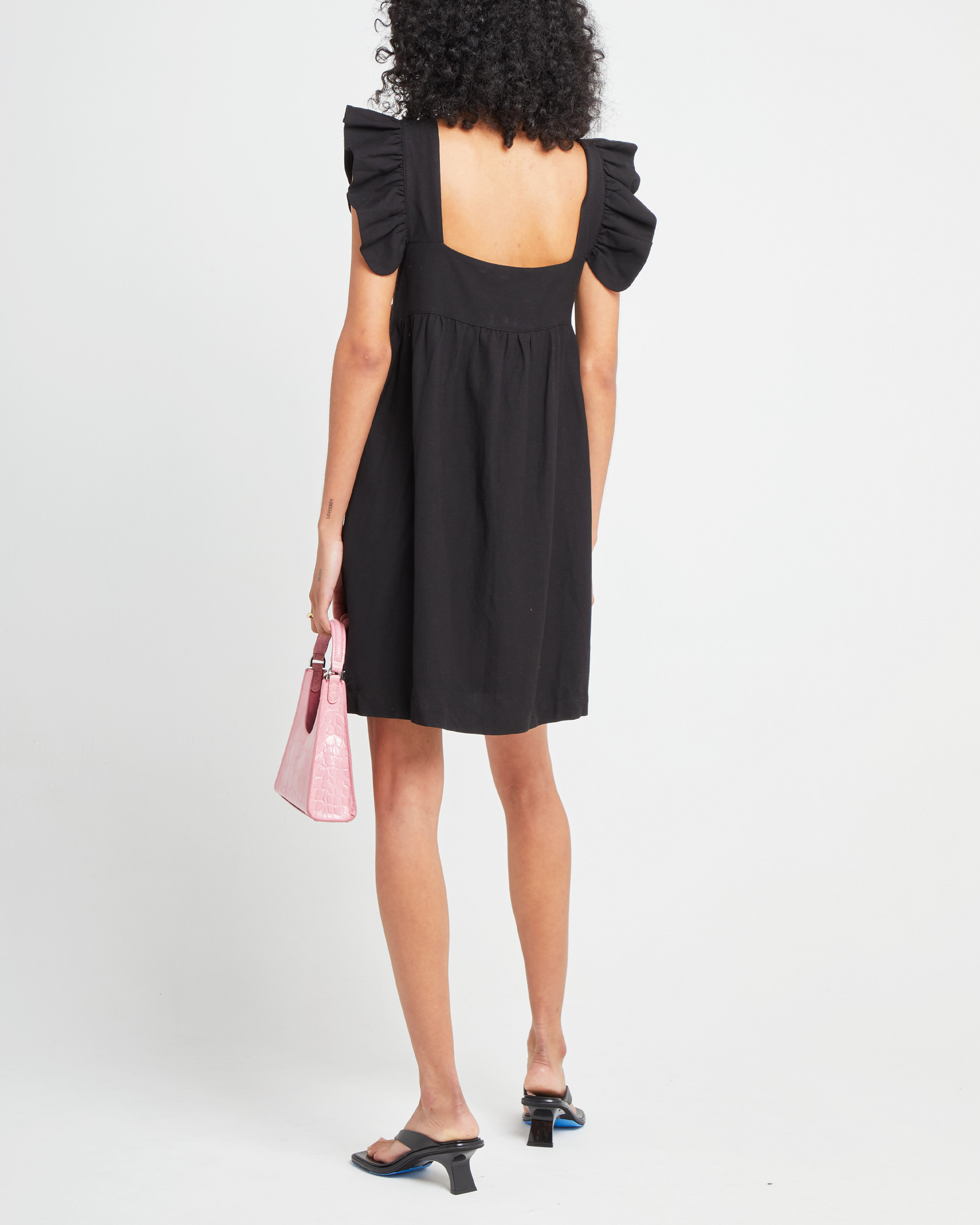 Second image of Aria Dress, a black mini dress, ruffle sleeves, retro, babydoll, square neckline