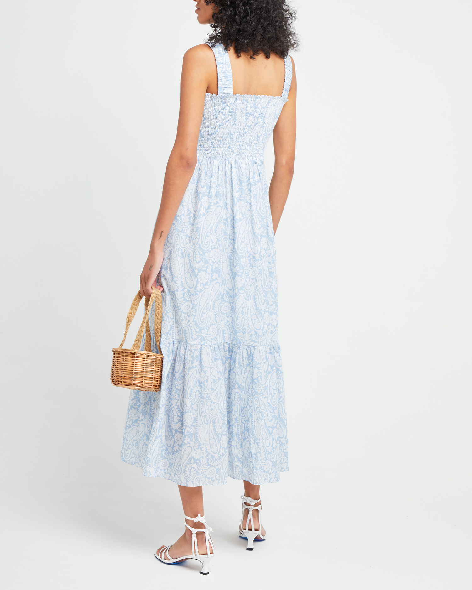Second image of Cotton Isla Dress, a blue midi dress, smocked, square neckline, tiered skirt