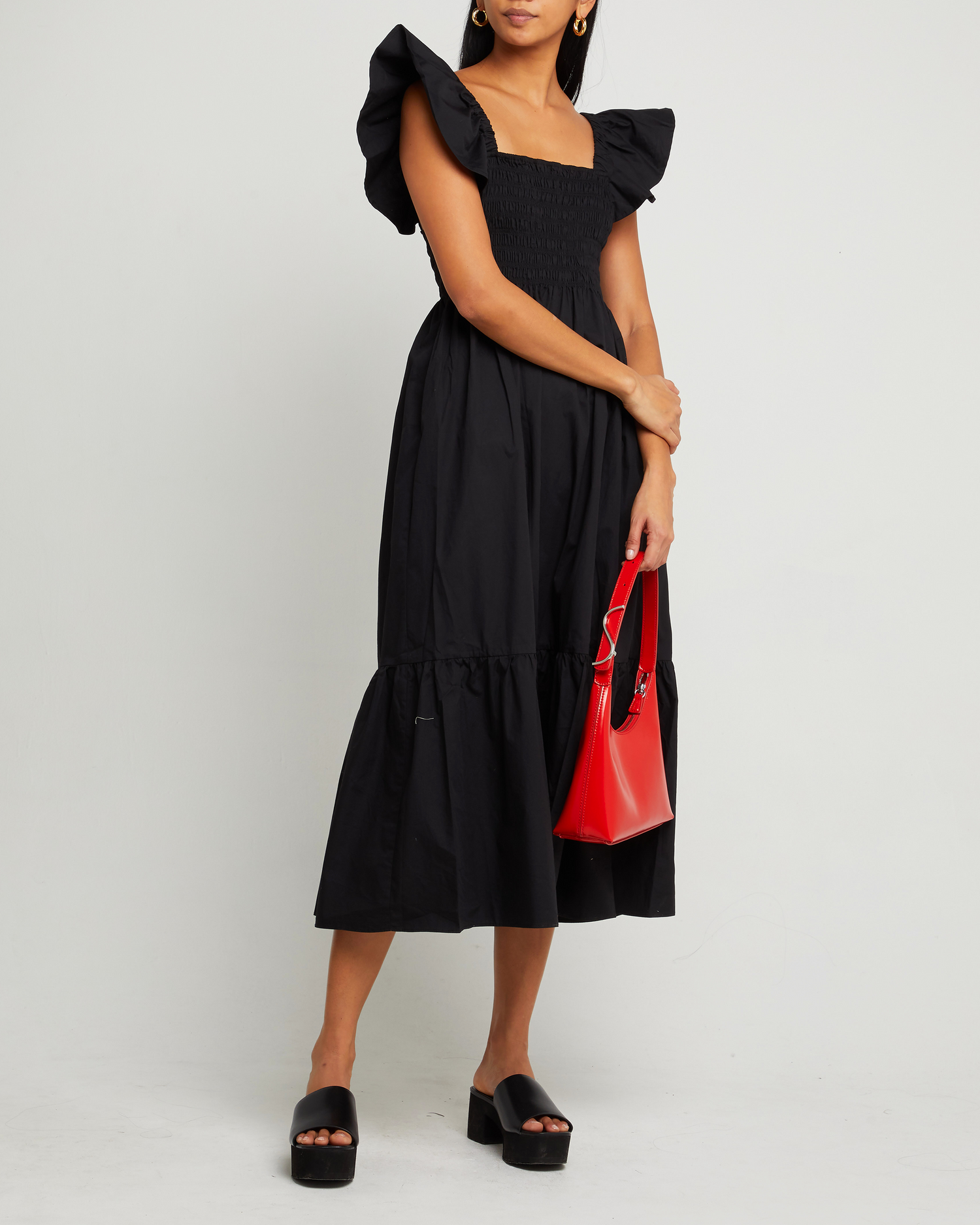 Fourth image of Tuscany Dress, a black maxi dress, smocked bodice, ruffled cap sleeves, pockets