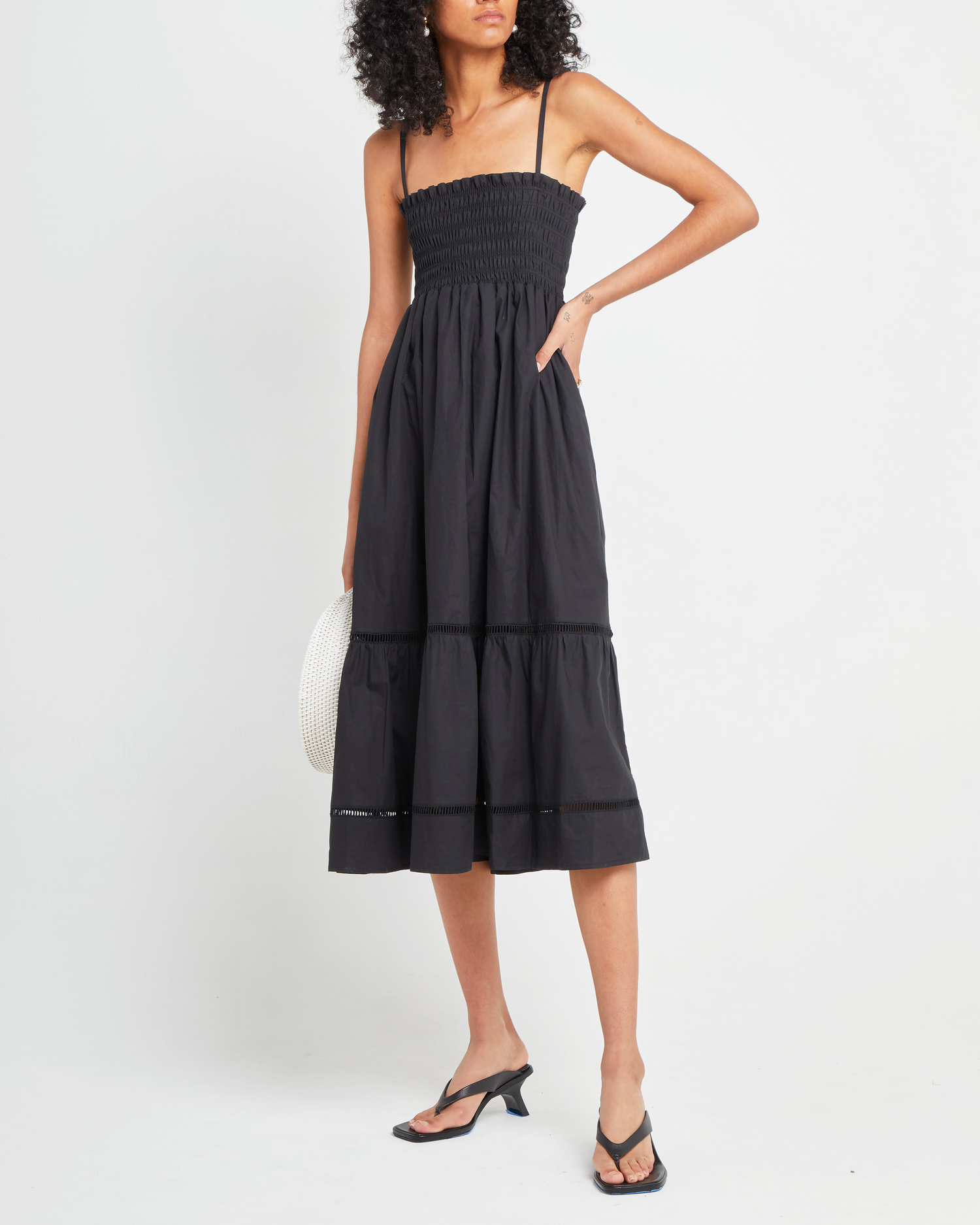 Fifth image of Cotton Leila Dress, a black midi dress, spaghetti strap, smocked bodice, tiered skirt