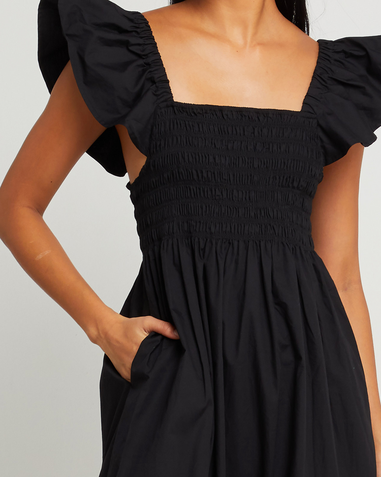 Sixth image of Tuscany Dress, a black maxi dress, smocked bodice, ruffled cap sleeves, pockets