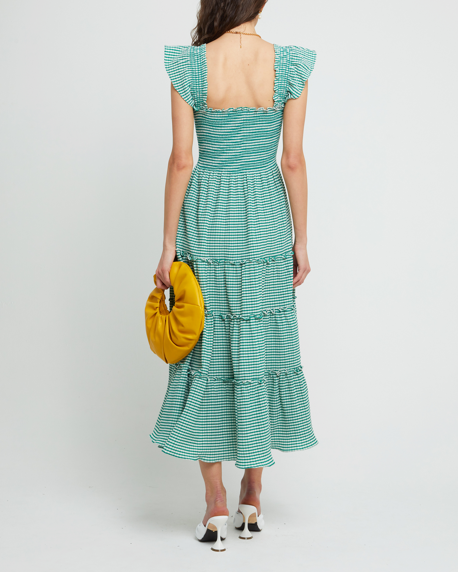 Second image of Calypso Maxi Dress, a green maxi dress, ruffle cap sleeves, smocked bodice