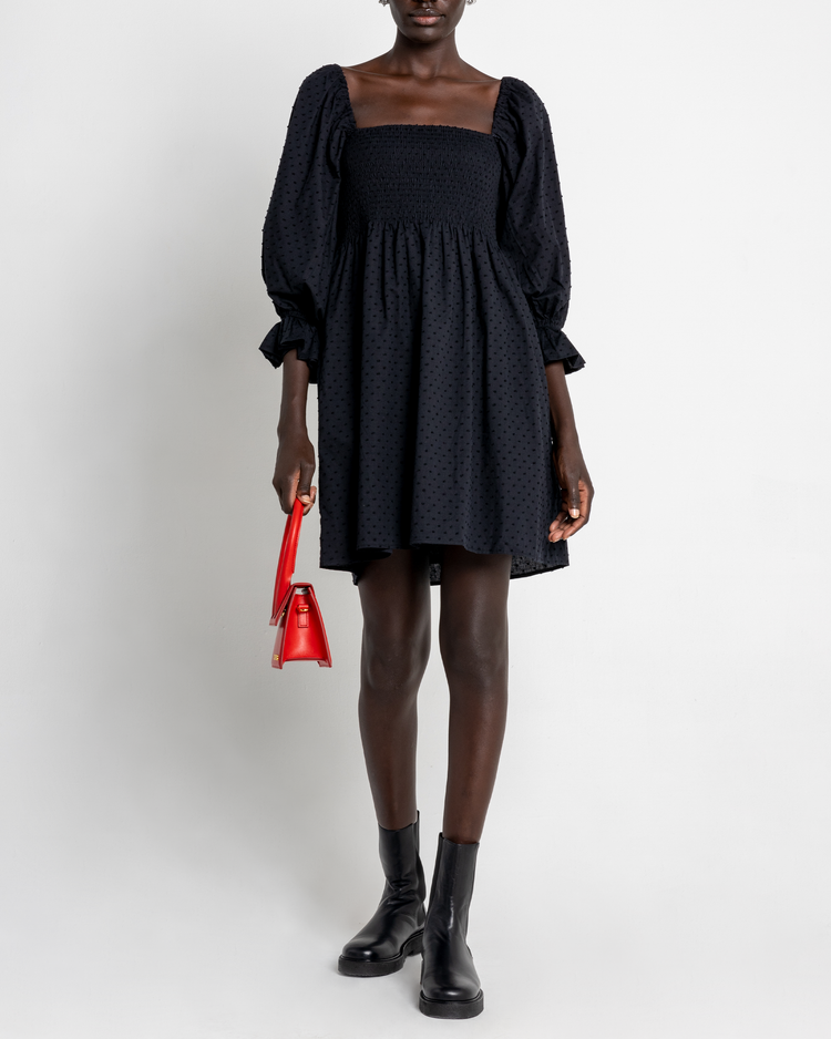 Fourth image of Portia Mini Dress, a black mini dress, puff sleeves, square neckline, smocked bodice, 3/4 sleeves