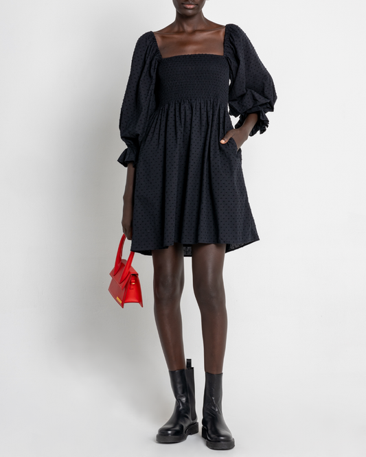 First image of Portia Mini Dress, a black mini dress, puff sleeves, square neckline, smocked bodice, 3/4 sleeves
