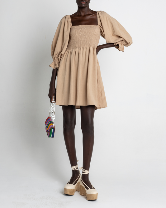 First image of Portia Mini Dress, a brown mini dress, puff sleeves, square neckline, smocked bodice, 3/4 sleeves