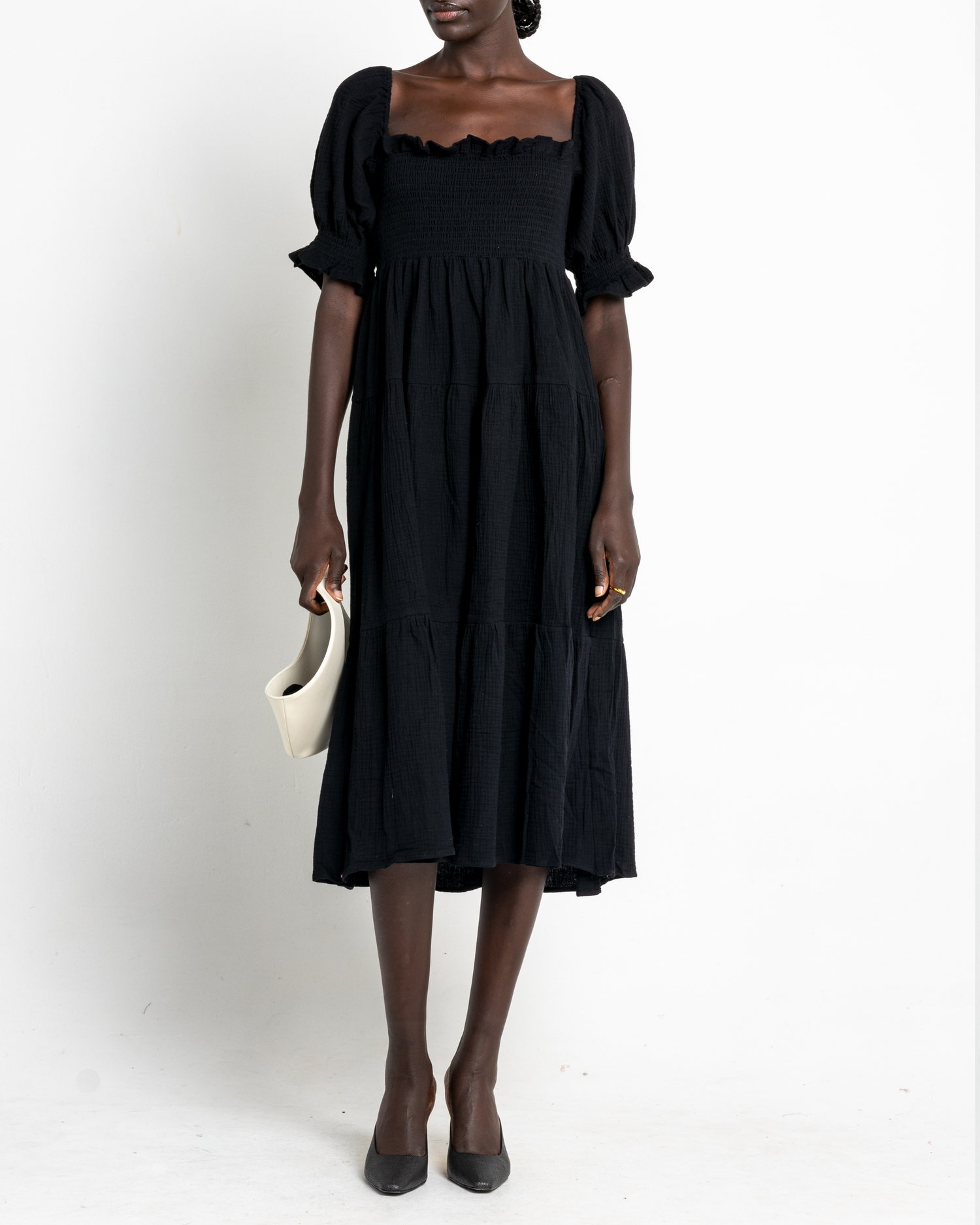 Third image of Frankie Dress, a black midi dress, puff sleeves, short sleeves