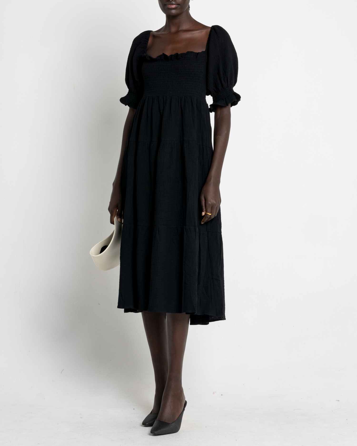 Fifth image of Frankie Dress, a black midi dress, puff sleeves, short sleeves