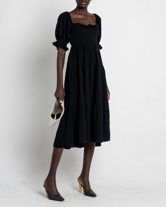 First image of Frankie Dress, a black midi dress, puff sleeves, short sleeves
