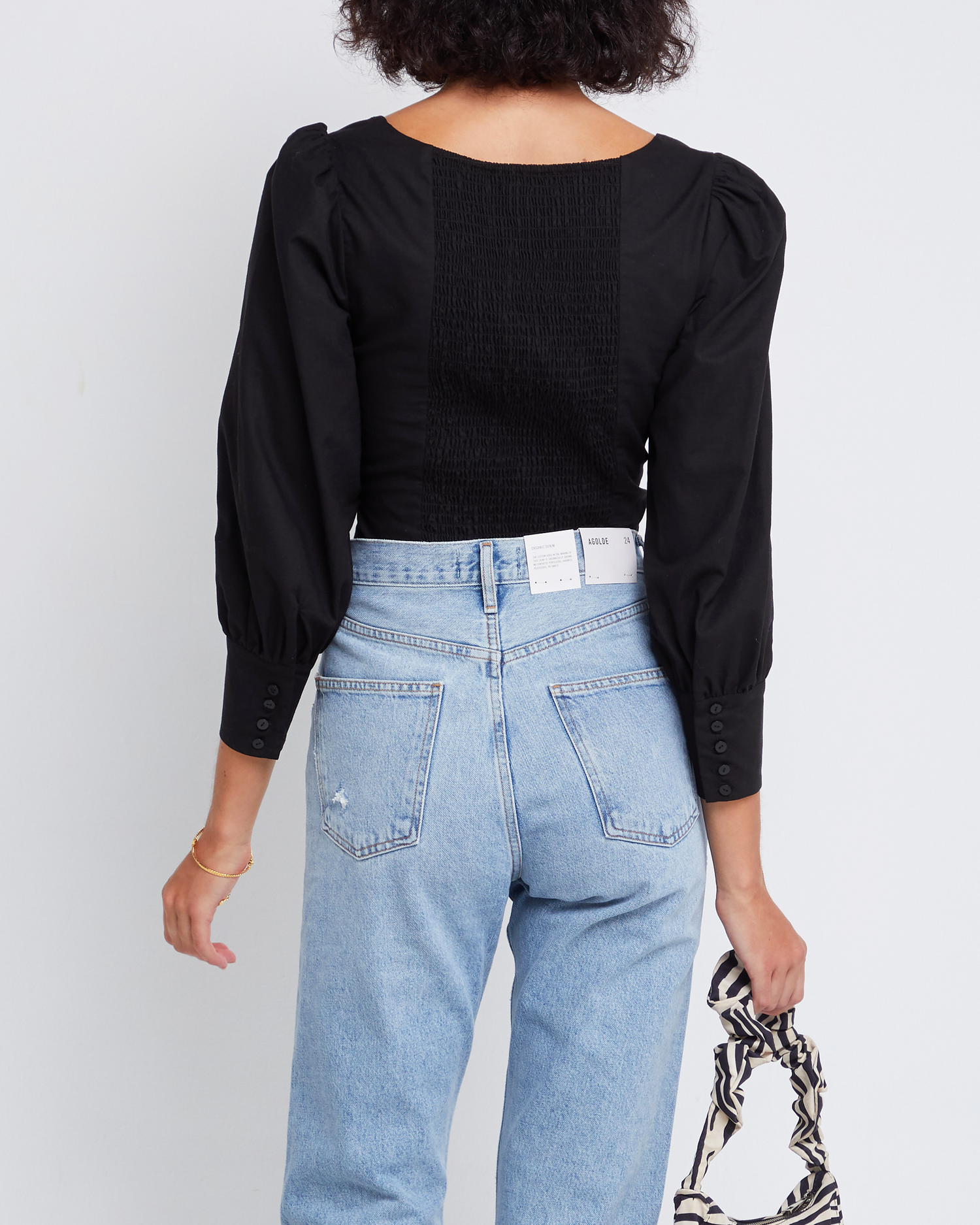 Second image of Sipora Top, a black puff sleeve top, long sleeve, puff sleeve, square neckline