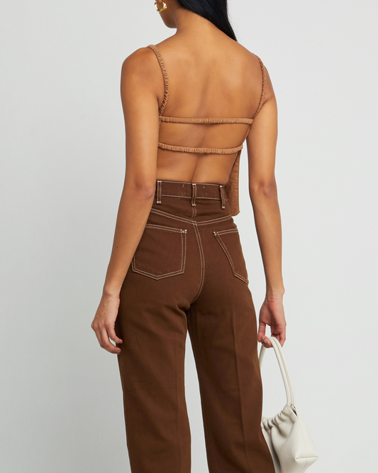 First image of Carina Tank, a brown sleeveless top, open back, two elastic straps across back, thin elastic straps