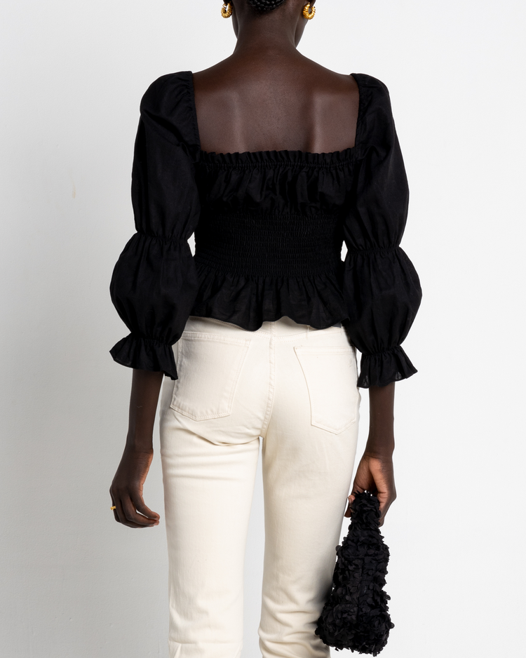 Second image of Gia Top, a black puff sleeve top, puff sleeves, square neckline