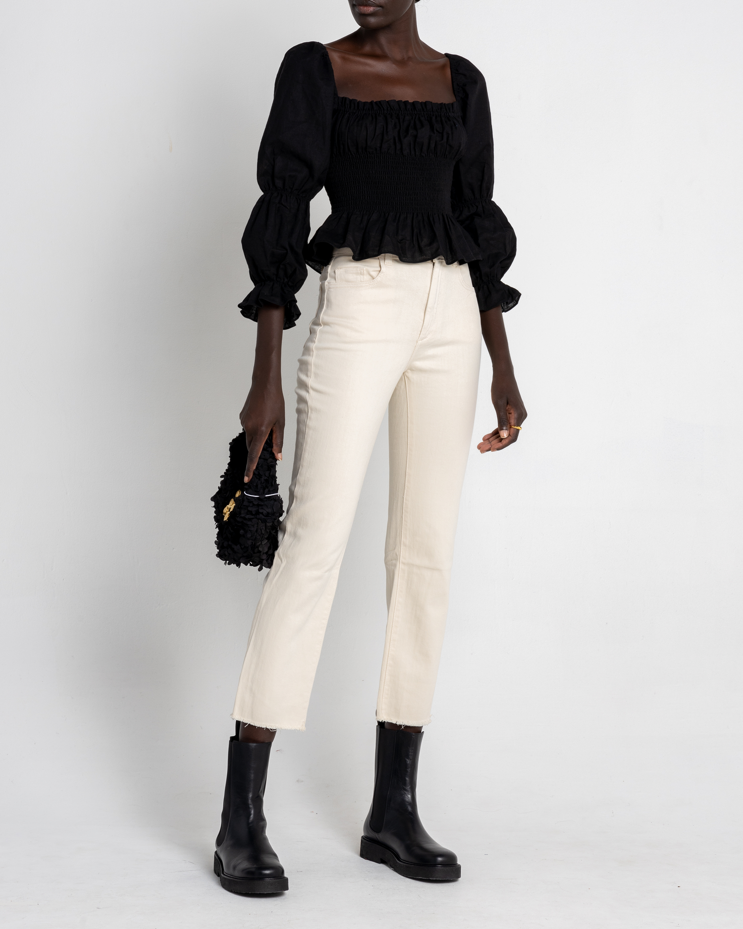 Third image of Gia Top, a black puff sleeve top, puff sleeves, square neckline