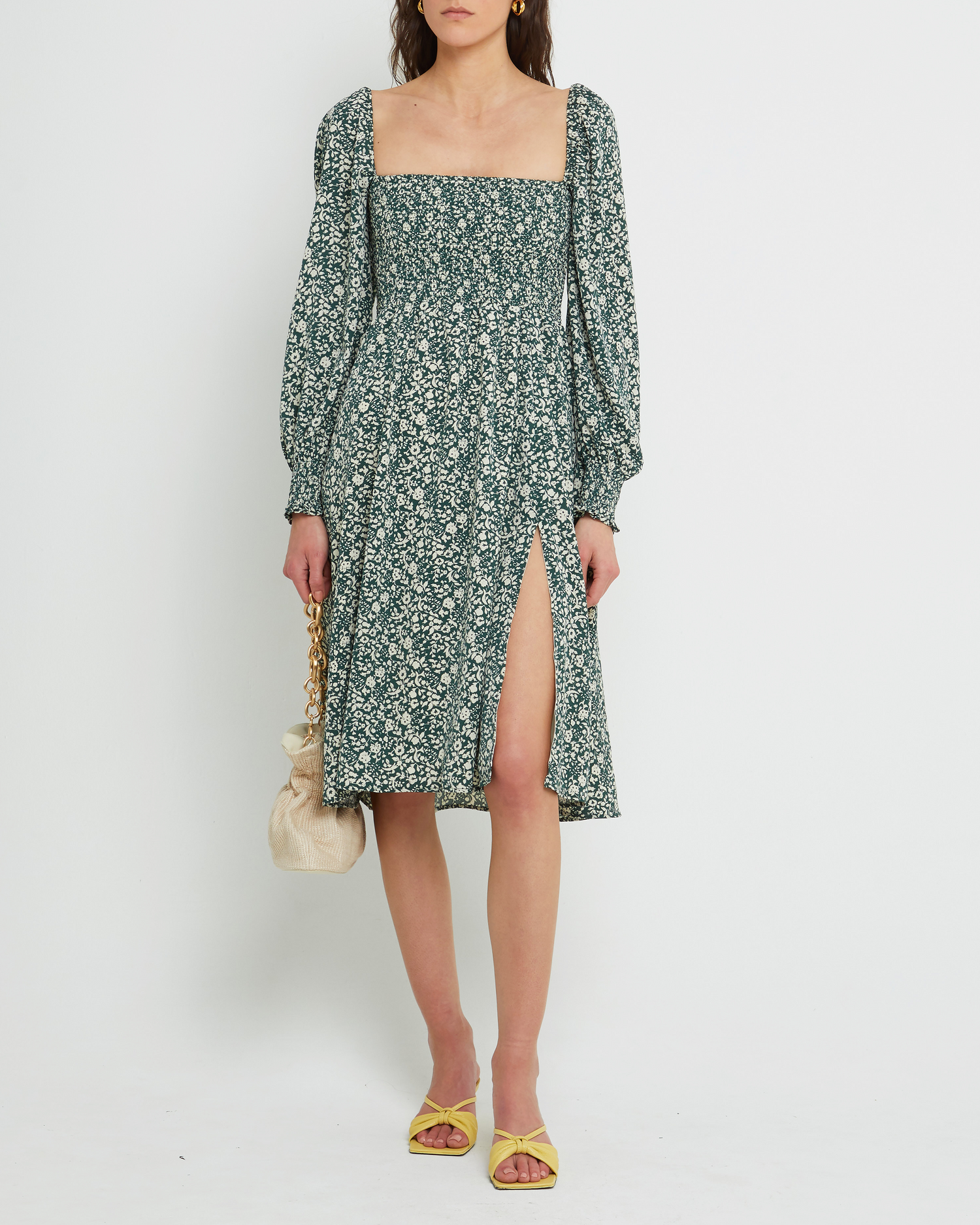 First image of Classic Smocked Midi Dress, a green midi dress, side slit, long, sheer sleeves, puff sleeves, square neckline, smocked bodice