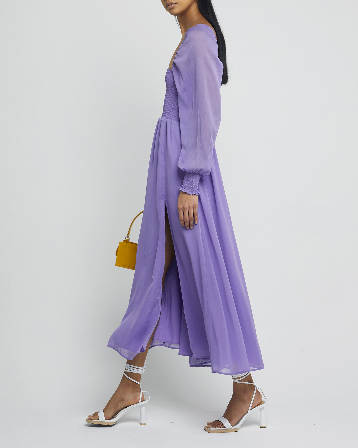 Third image of Classic Smocked Maxi Dress, a purple maxi dress, side slit, long, sheer sleeves, puff sleeves, square neckline, smocked bodice