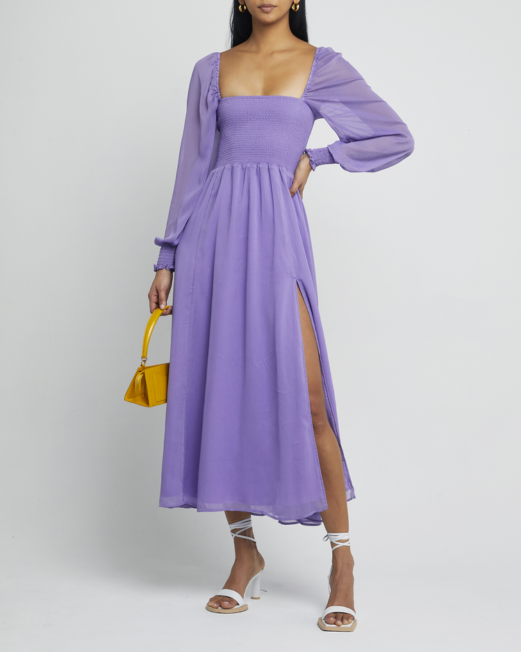 Fifth image of Classic Smocked Maxi Dress, a purple maxi dress, side slit, long, sheer sleeves, puff sleeves, square neckline, smocked bodice