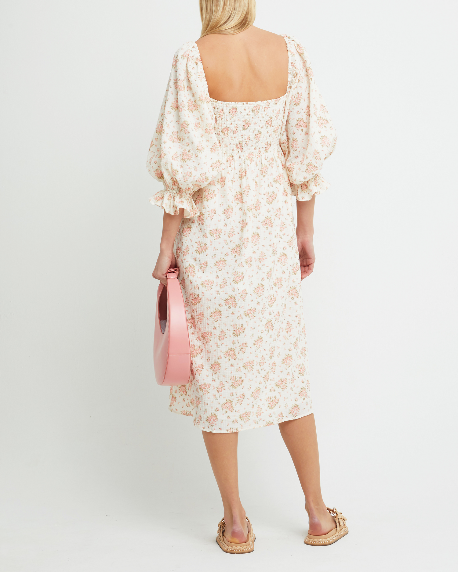 Second image of Athena Dress, a pink midi dress, off shoulder, long sleeve, puff sleeves, smocked