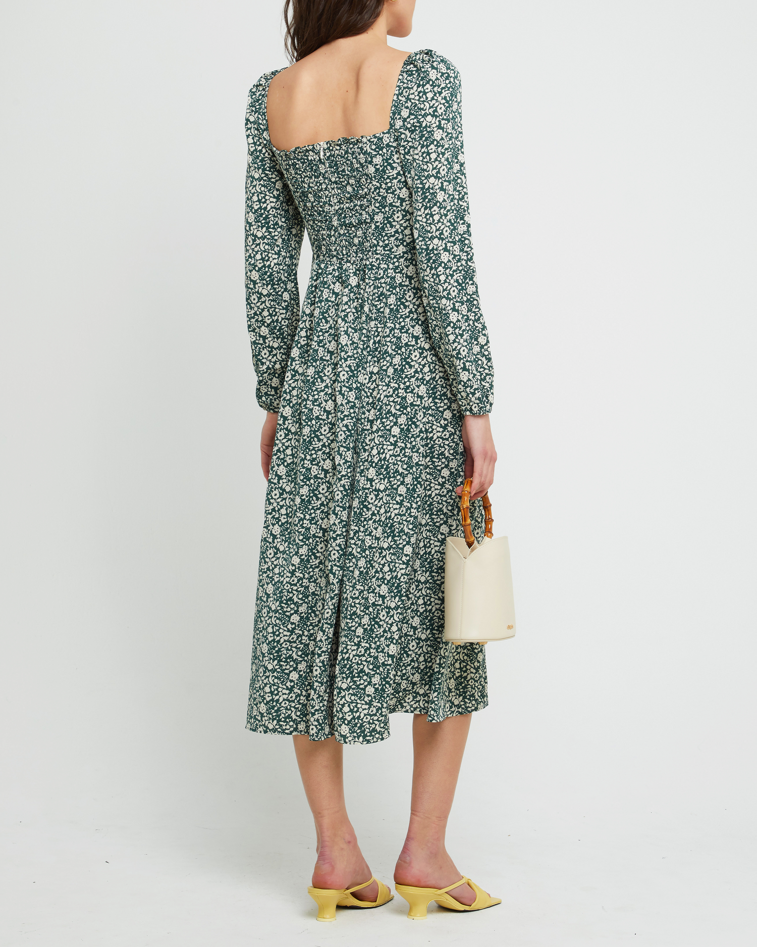 Second image of Lenon Dress, a green midi dress, side skirt slit, long sleeves, square neckline
