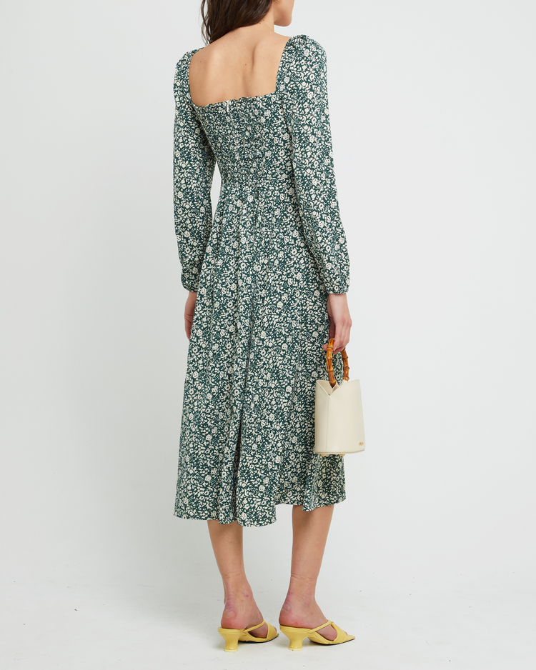 Second image of Lenon Dress, a green midi dress, side skirt slit, long sleeves, square neckline