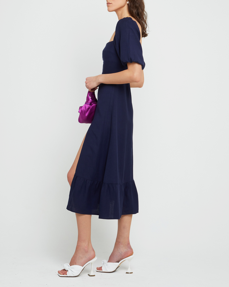 Third image of Violetta Midi Dress, a blue midi dress, sweetheart neckline, short sleeves, puff sleeves, side slit