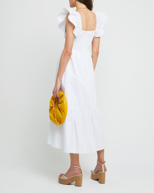 Second image of Tuscany Dress, a white maxi dress, smocked bodice, ruffled cap sleeves, pockets