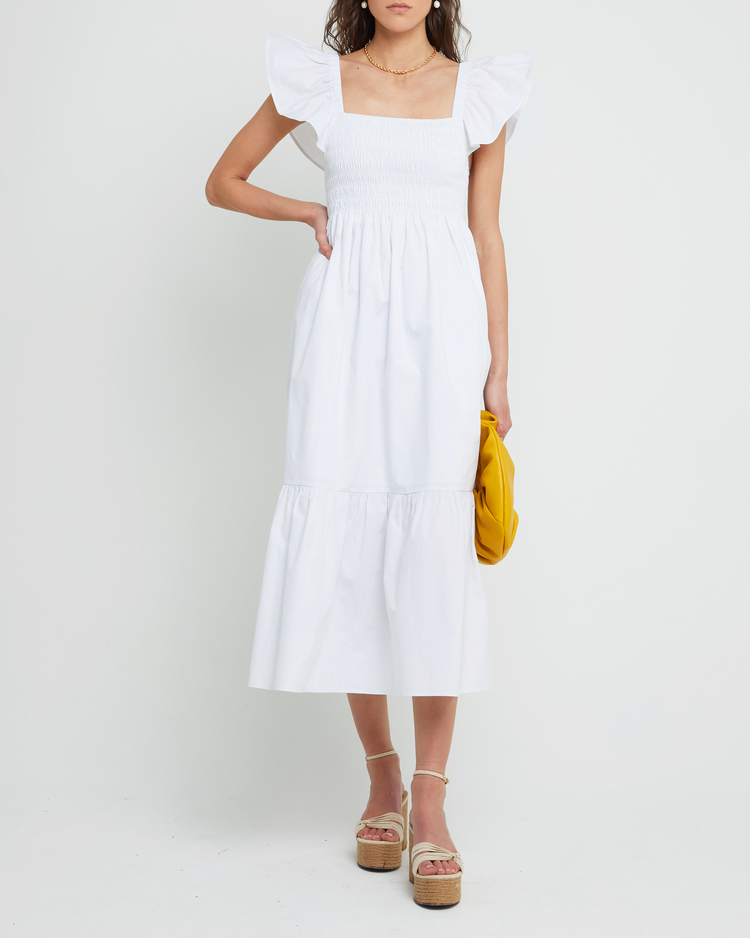 Fourth image of Tuscany Dress, a white maxi dress, smocked bodice, ruffled cap sleeves, pockets