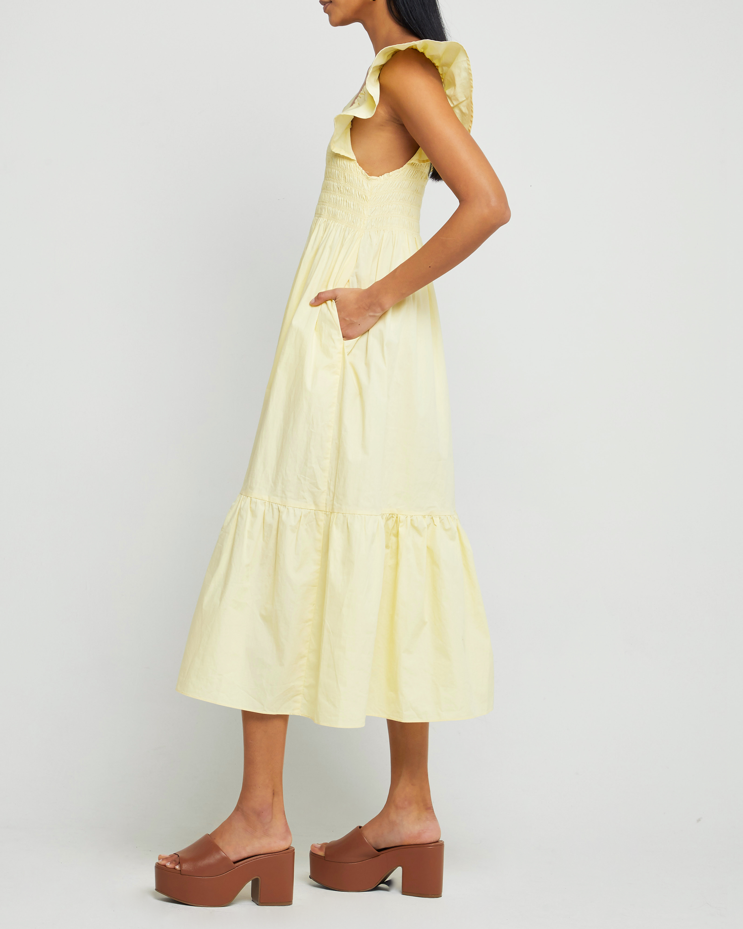 Third image of Tuscany Dress, a yellow midi dress, smocked bodice, ruffled cap sleeves, pockets