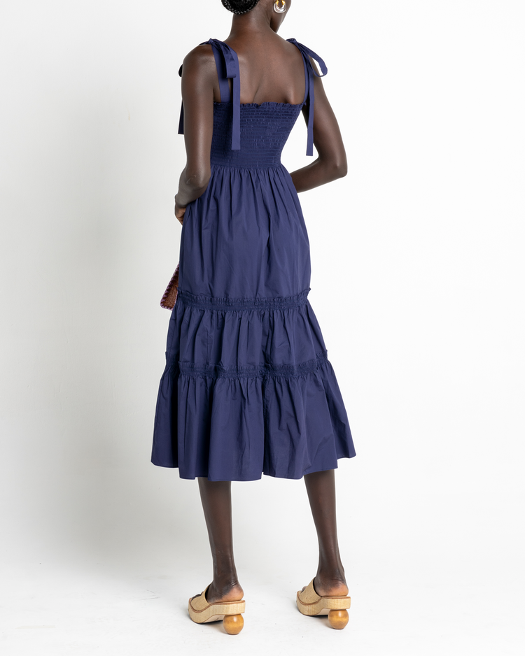 Second image of Cara Dress, a blue maxi dress, tie straps, ribbon straps, bows, tiered skirt, smocked bodice