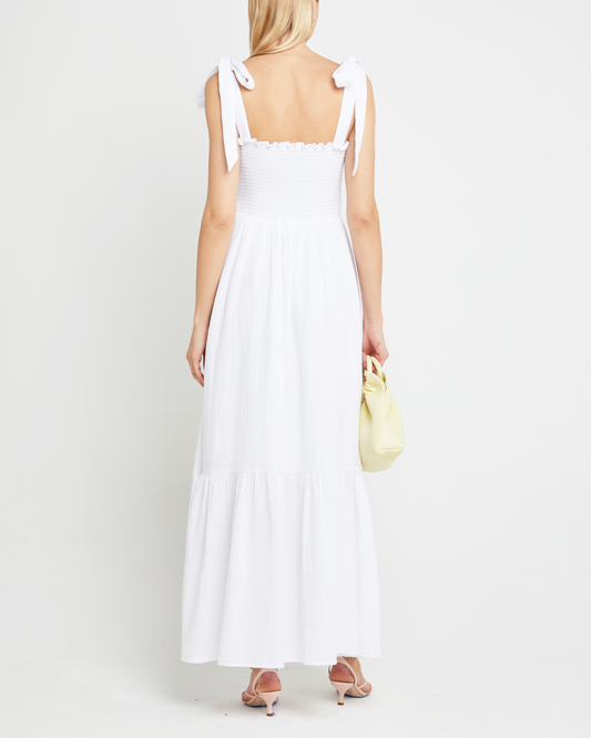 Second image of Cotton Winnie Dress, a white maxi dress, tie straps, smocked bodice