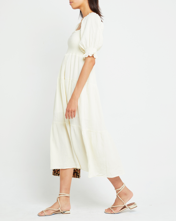Fourth image of Frankie Dress, a white midi dress, smocked bodice, short sleeve, puff sleeve