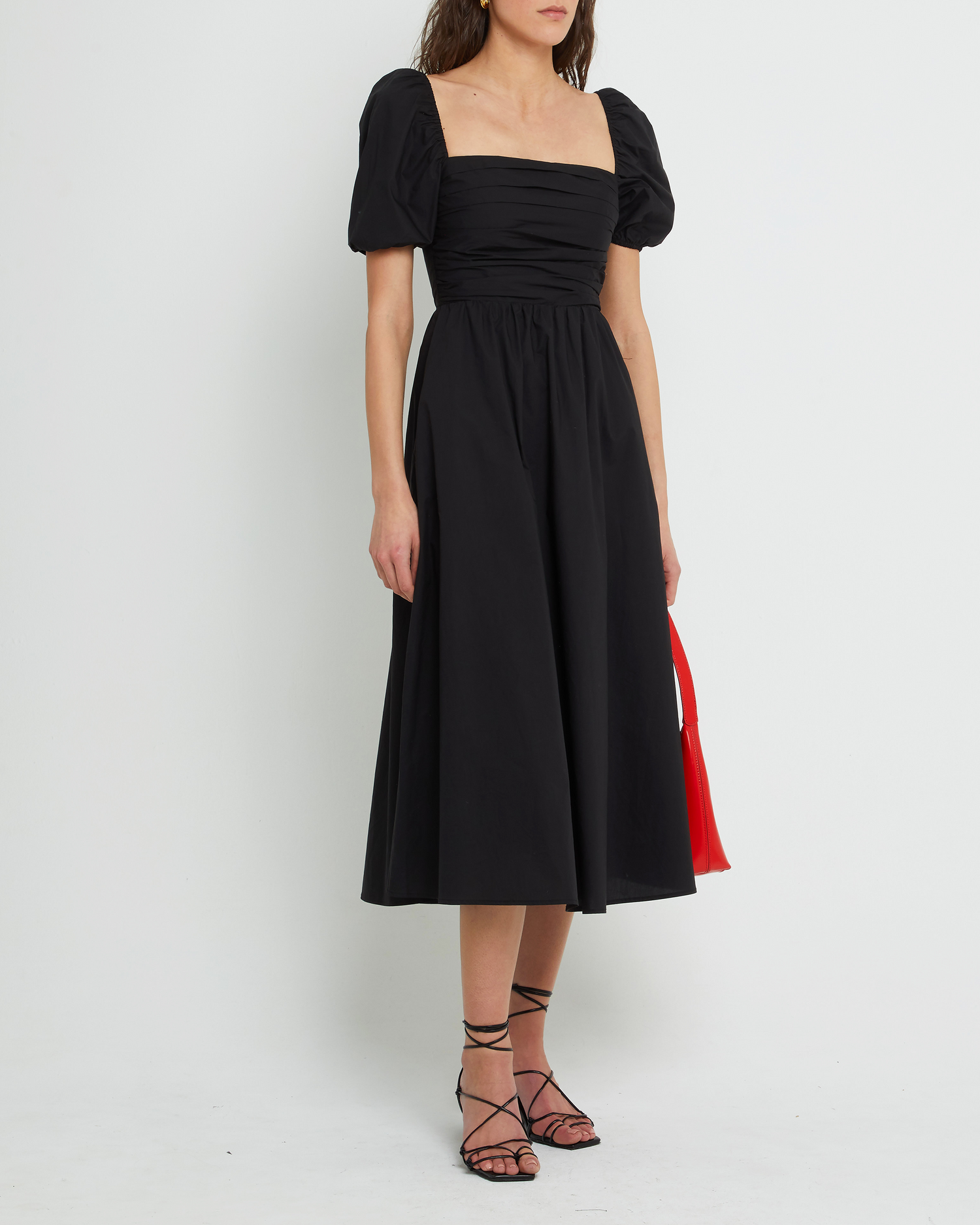 Fourth image of River Dress, a black midi dress, square neckline, short puff sleeves, gathered bodice