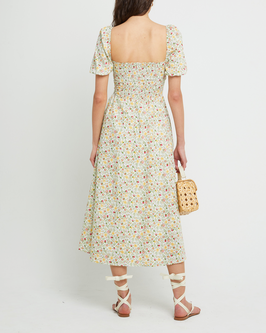 Second image of River Dress, a floral midi dress, square neckline, short puff sleeves, gathered bodice