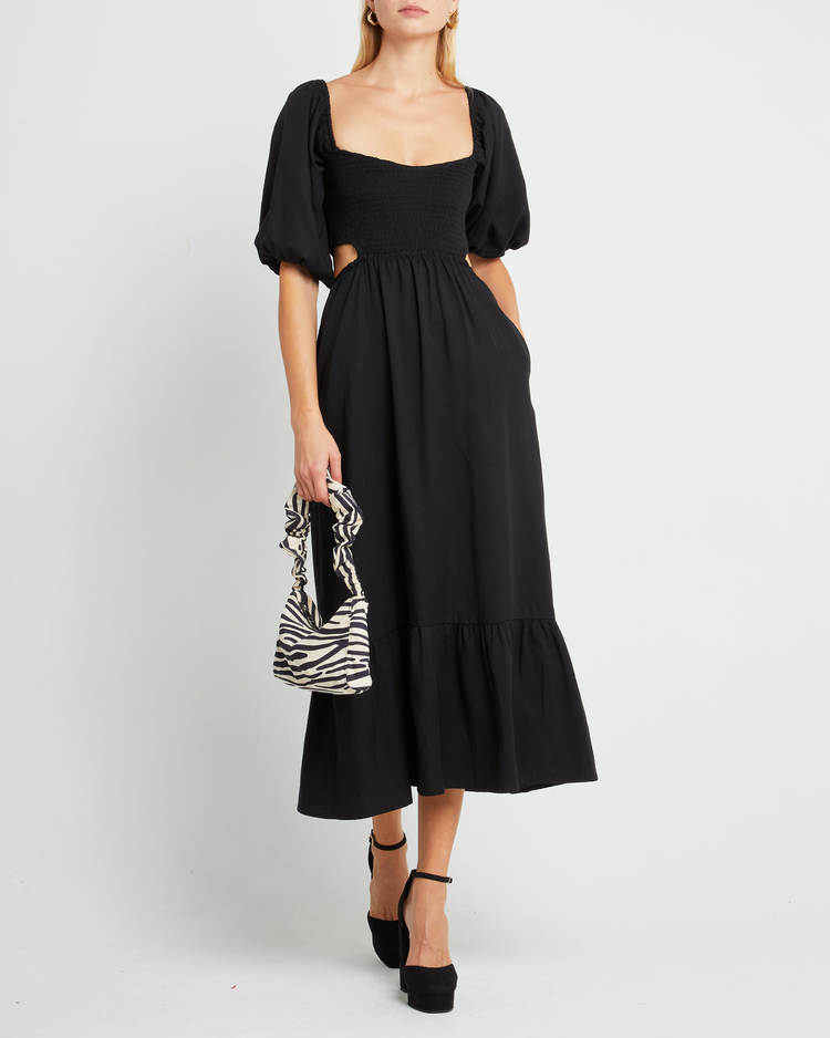 Fourth image of Leighton Dress, a black maxi dress, open back, short sleeve, puff sleeve, pocket, cut out