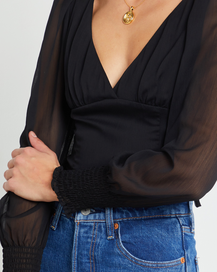 Sixth image of Briana Top, a black puff sleeve top, V-neck, plunge, sheer, long sleeve, chiffon