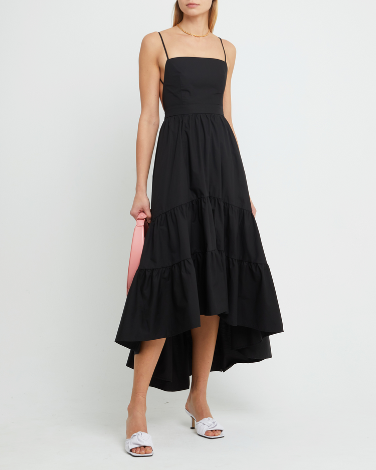 First image of Dionne Cotton Dress, a black maxi dress, spaghette straps, high-low, high low skirt