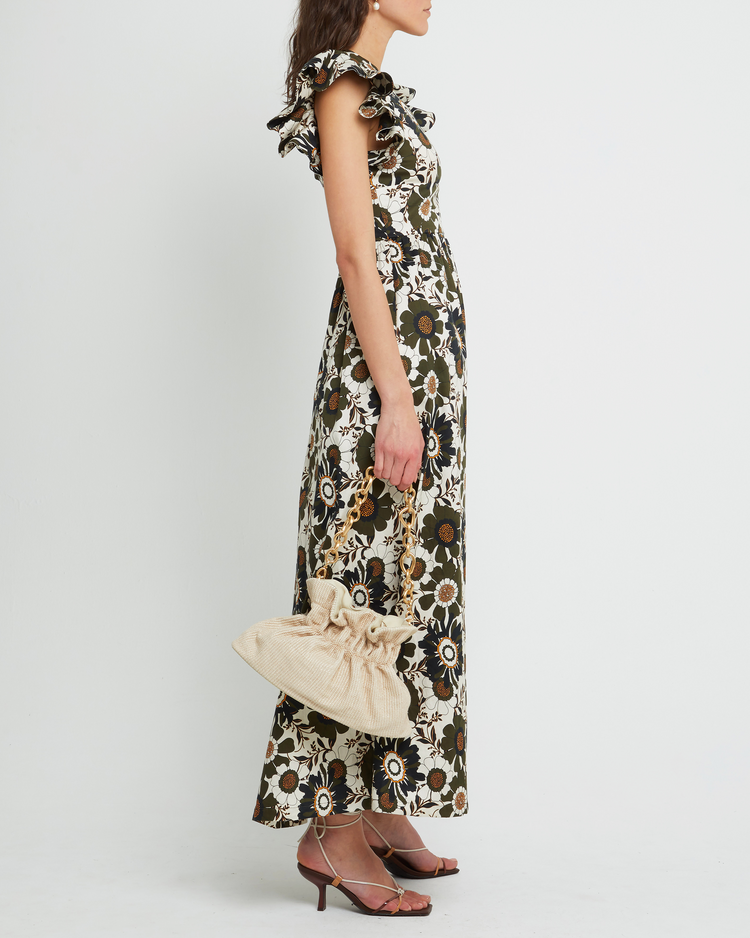 Third image of Martinelli Dress, a white maxi dress, ruffle cap sleeves, pockets, floral print, bold, high neck