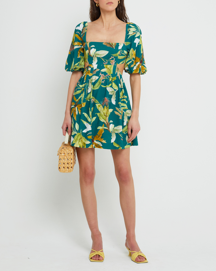 First image of Luciana Dress, a green mini dress, tropical, puff sleeves, square neckline