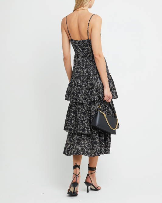 Second image of Nadira Dress, a black midi dress, tiered skirt, floral, spaghetti straps, cami