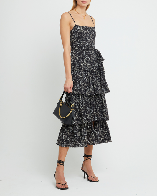First image of Nadira Dress, a black midi dress, tiered skirt, floral, spaghetti straps, cami